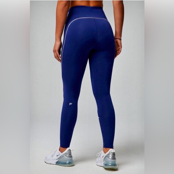 Fabletics Deep Blue Leggings with White Accents - Picture 2 of 10